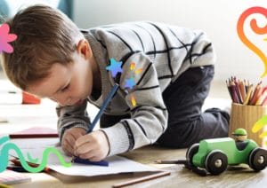 Child focused on drawing